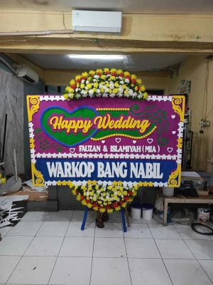 Papan Bunga di Ujung Menteng