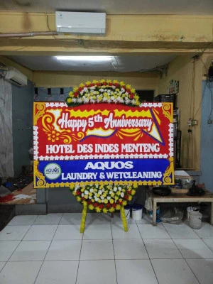 Papan Bunga di Ujung Menteng