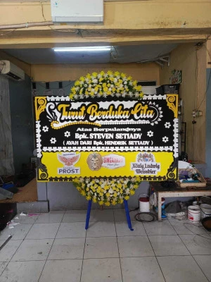 Papan Bunga di Ujung Menteng