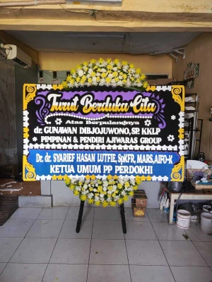 Papan Bunga di Ujung Menteng